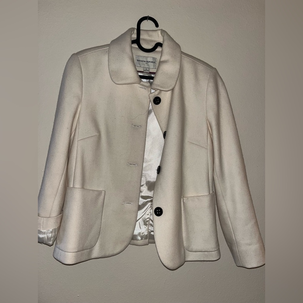 White coat black button
